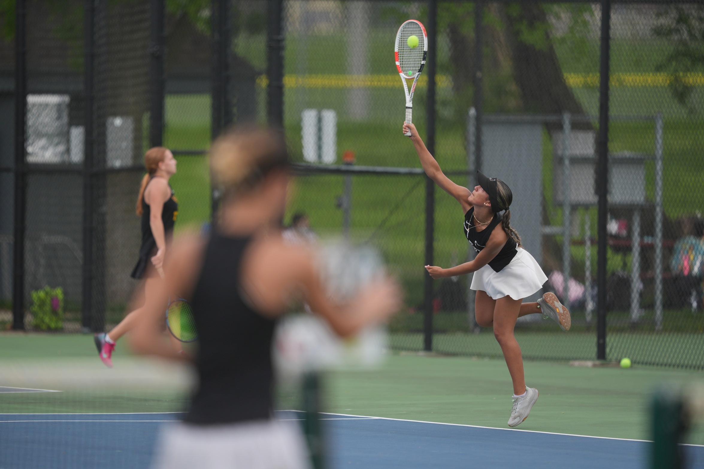 Girls Tennis Hosts Dowling on Rain Makeup
